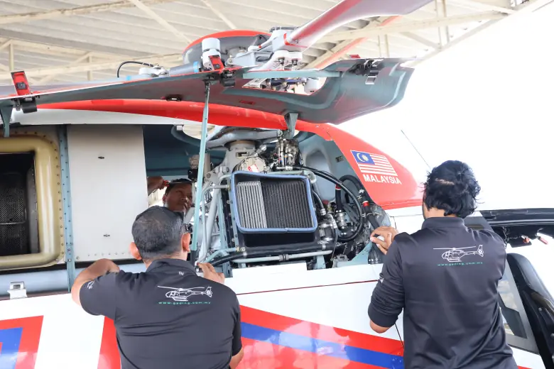 Aircraft maintenance activity inside the GKSB hangar